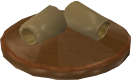 File:Reinald's Smithing Emporium Gold wristguards stand.png