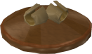 File:Reinald's Smithing Emporium Gold clasps stand.png