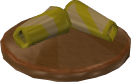 File:Reinald's Smithing Emporium Gold banding stand.png