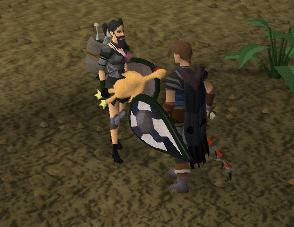 A player whacking another player with a Rubber Chicken