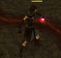 A player wielding a red magic orb.
