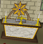 A Gilded marble altar with a symbol of Guthix.