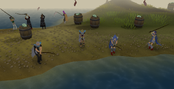 Players fishing on the beach.