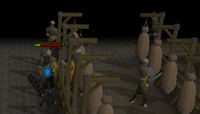 The last trainee In Varrock, oddly not seeing his city is under attack.