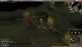 A player attacking a Dagannoth Mother with an Earth Spell.