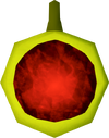 A detailed image of an unstrung ruby amulet.