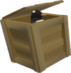 A penguin in a crate.